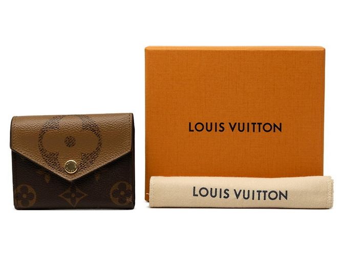 Louis Vuitton Monogram Giant Reverse Portefeuille Zoe Tri-fold Wallet Castaño Monograma - vista 6