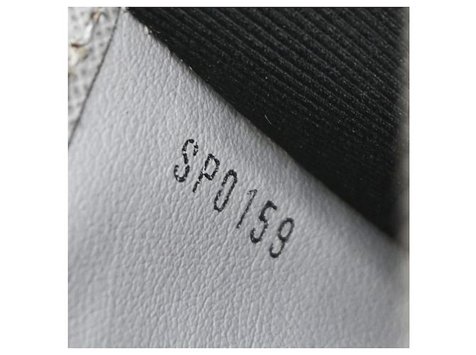 Louis Vuitton Discovery Pochette Monogram Taigarama PM Blanc - vue 7