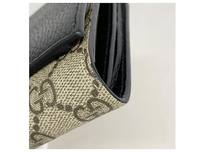 Cartera bi-fold Gucci GG Marmont Supreme Negro Beige - vista 5