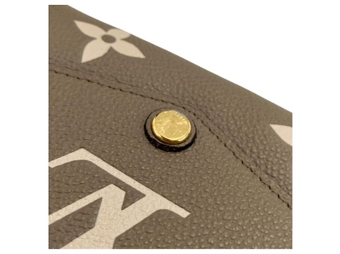Sarah Cartera Larga Louis Vuitton Monogram Empreinte Gris - vista 8