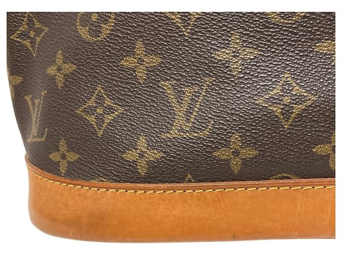 Bolsa Louis Vuitton Alma MM Monogram Marrom - vista 12
