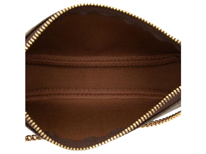 Bolsa de Mão Mini Pochette Accessoires Monogram Louis Vuitton Castanha Marrom - vista 4