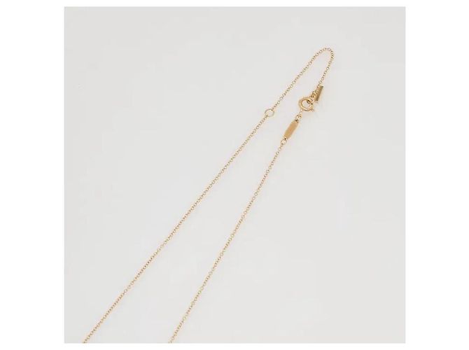 Tiffany & Co Una collana che mette in risalto la brillantezza distintamente calda ed elegante del materiale. Il suo design curvo e grazioso, che evoca un sorriso all'angolo della bocca, crea un'atmosfera sofisticata, e il D'oro - vista 4