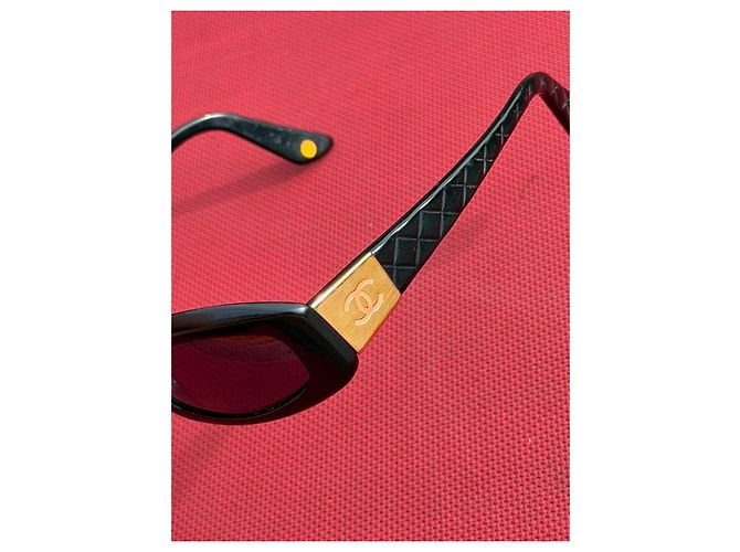 Chanel Sonnenbrille Schwarz mit orangefarbenem CC-Logo - Ansicht 11