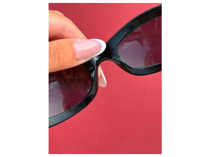 Chanel Sonnenbrille Schwarz mit orangefarbenem CC-Logo - Ansicht 9