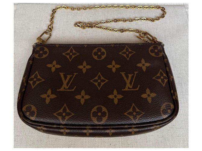 Multi Pochette Louis Vuitton Mini Pochette Accessoires Monogram Castaño Monograma - vista 15