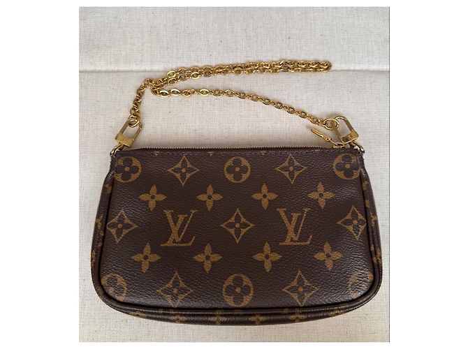 Multi Pochette Louis Vuitton Mini Pochette Accessoires Monogram Castaño Monograma - vista 18