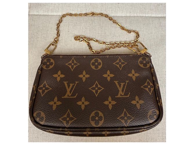 Multi Pochette Louis Vuitton Mini Pochette Accessoires Monogram Castaño Monograma - vista 19