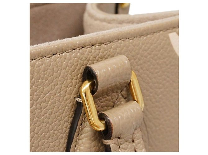 Sac à main Louis Vuitton Monogram Empreinte Bicolor OnTheGo PM Gris Écru - vue 12