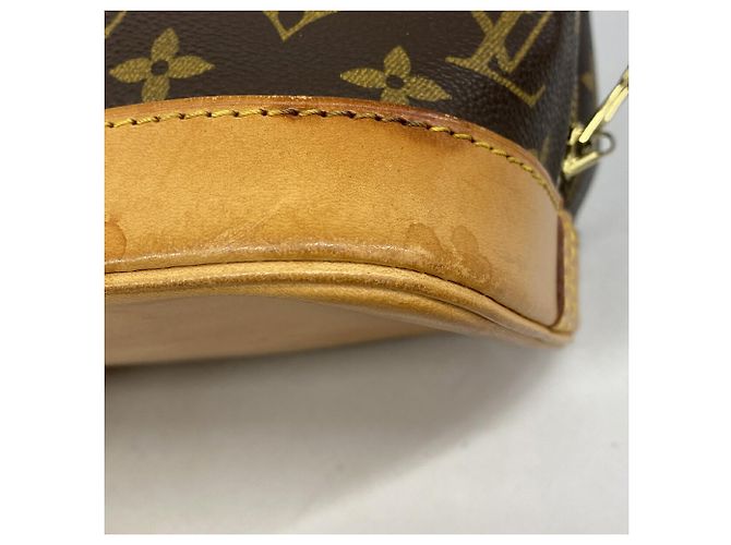 Bolso de mano Louis Vuitton Alma Monogram M51130 Castaño - vista 6