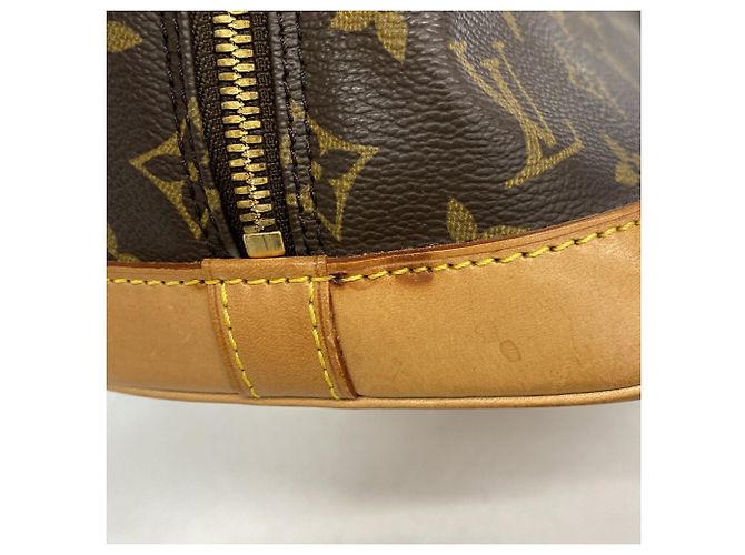 Bolso de mano Louis Vuitton Alma Monogram M51130 Castaño - vista 8