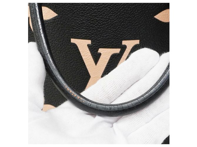 Borsa Tote Louis Vuitton Monogram Empreinte Bicolor OnTheGo MM Nero Beige - vista 8