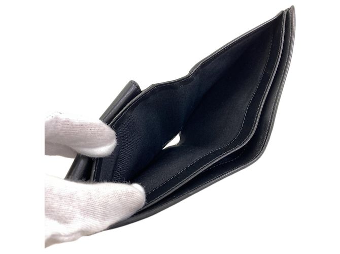 Céline Portafoglio in pelle bi-fold con logo Celine da uomo Nero - vista 5