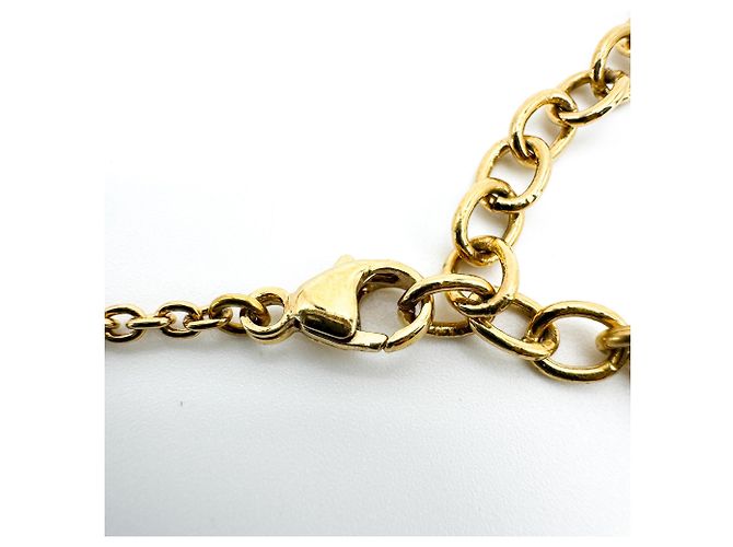 Louis Vuitton Essential V Metal Dorado - vista 5