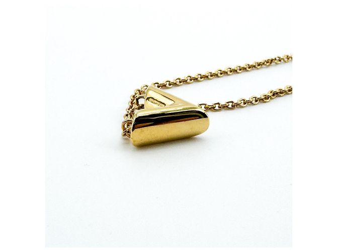 Louis Vuitton Essential V Metal Dorado - vista 7