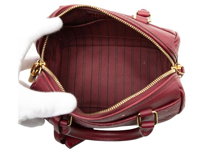 Louis Vuitton Speedy Bandoulière 20 Monogram Empreinte Rosso - vista 4