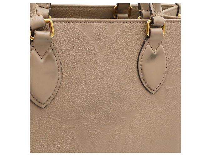 Saco Tote Louis Vuitton Monogram Empreinte OnTheGo MM Cinza - vista 10