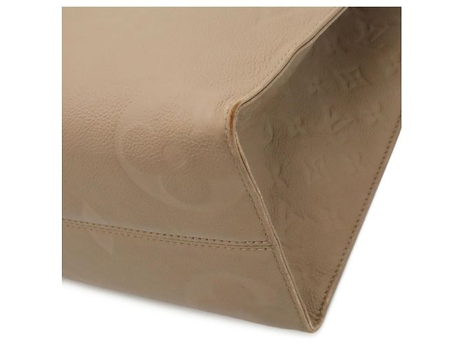 Saco Tote Louis Vuitton Monogram Empreinte OnTheGo MM Cinza - vista 4