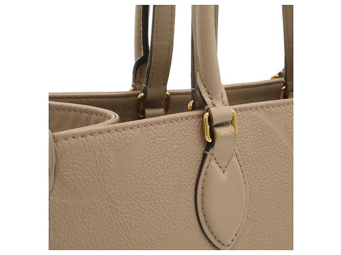 Saco Tote Louis Vuitton Monogram Empreinte OnTheGo MM Cinza - vista 9