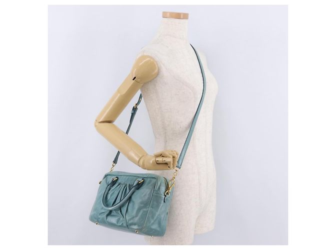 Borsa Miu Miu Vitellolux Matelasse in pelle 2way Blu Turchese Oro Auth 206286M D'oro - vista 30