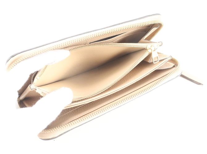 Louis Vuitton Monogram Empreinte Zippy Wallet in Dune - view 7