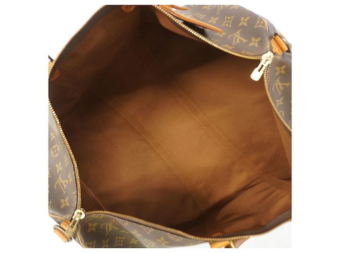 Louis Vuitton Boston Monogram Keepall Bandoulière 55 Castaño - vista 4