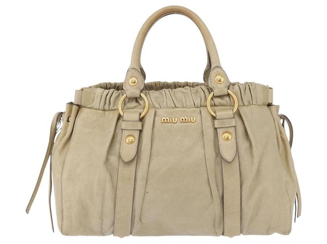 Bolsa de mão Miu Miu em couro bege e dourado Auth 206341A - vista 13