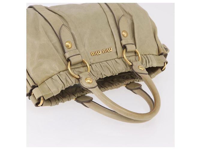 Bolsa de mão Miu Miu em couro bege e dourado Auth 206341A - vista 14