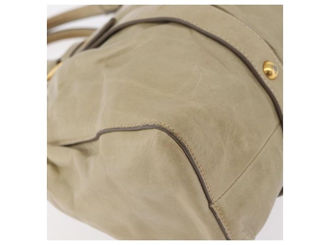 Bolsa de mão Miu Miu em couro bege e dourado Auth 206341A - vista 17