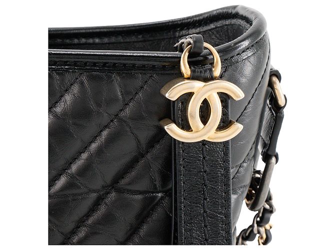CHANEL - Borsa a tracolla Gabrielle mini chevron in pelle stropicciata nera Nero - vista 5