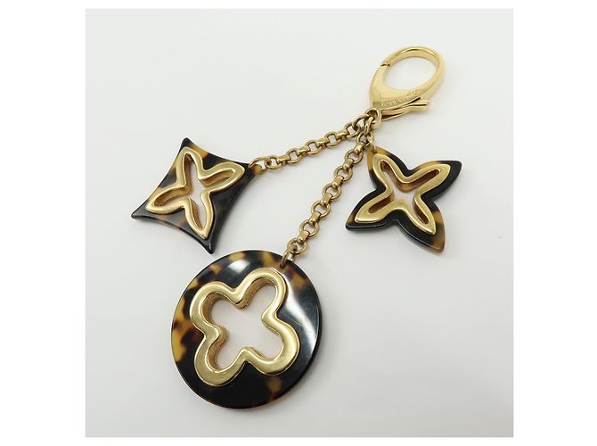 Charm per borsa Louis Vuitton Insolence in metallo e tartaruga D'oro - vista 3