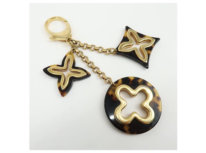Charm per borsa Louis Vuitton Insolence in metallo e tartaruga D'oro - vista 4