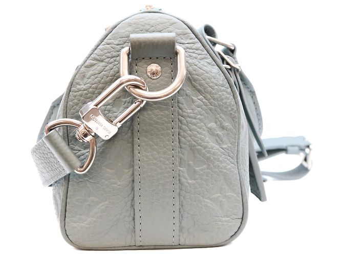 Louis Vuitton Keepall Bandoulière 25 in pelle Taurillon Verde - vista 4