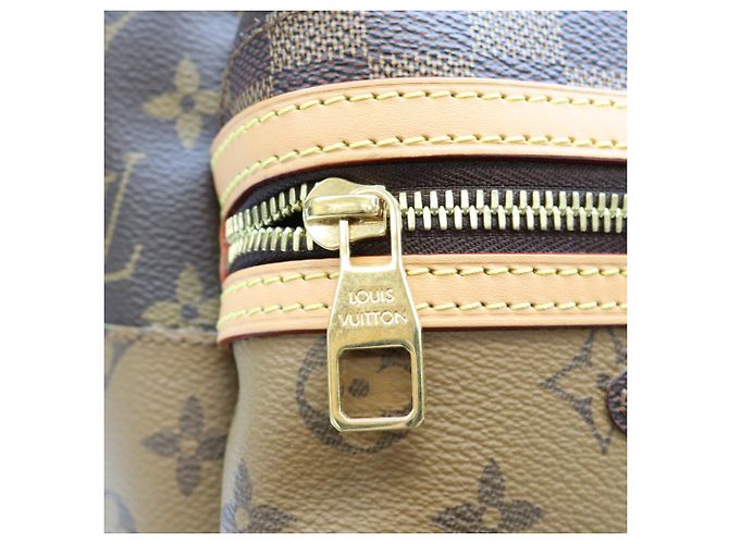 Mochila Louis Vuitton Monogram Discovery PM Castaño - vista 6