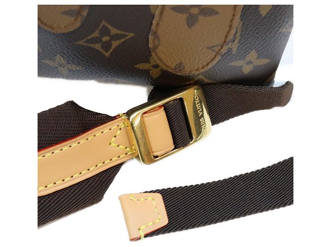 Mochila Louis Vuitton Monogram Discovery PM Castaño - vista 8