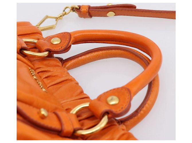 Borsa a mano Miu Miu con fiocco laterale in pelle 2way Orange Gold Auth am12762V D'oro Arancione - vista 14
