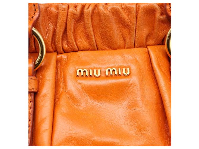 Borsa a mano Miu Miu con fiocco laterale in pelle 2way Orange Gold Auth am12762V D'oro Arancione - vista 20