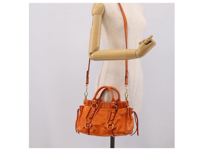 Borsa a mano Miu Miu con fiocco laterale in pelle 2way Orange Gold Auth am12762V D'oro Arancione - vista 25