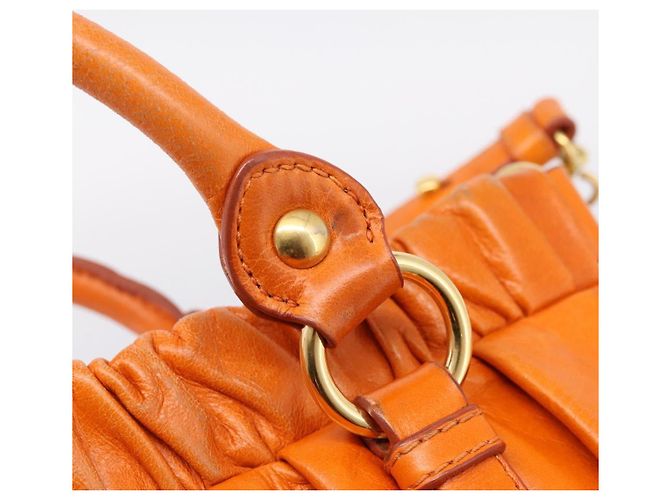 Borsa a mano Miu Miu con fiocco laterale in pelle 2way Orange Gold Auth am12762V D'oro Arancione - vista 9