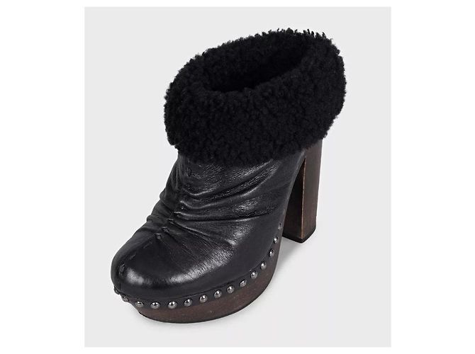 Botines Miu Miu de cuero negro con tacón bloque de madera Talla 36 De segunda mano - vista 2