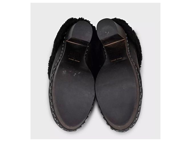 Botines Miu Miu de cuero negro con tacón bloque de madera Talla 36 De segunda mano - vista 4