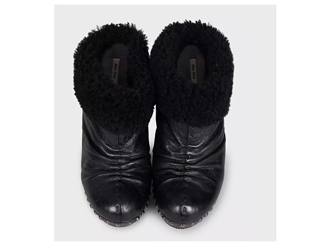 Botines Miu Miu de cuero negro con tacón bloque de madera Talla 36 De segunda mano - vista 5
