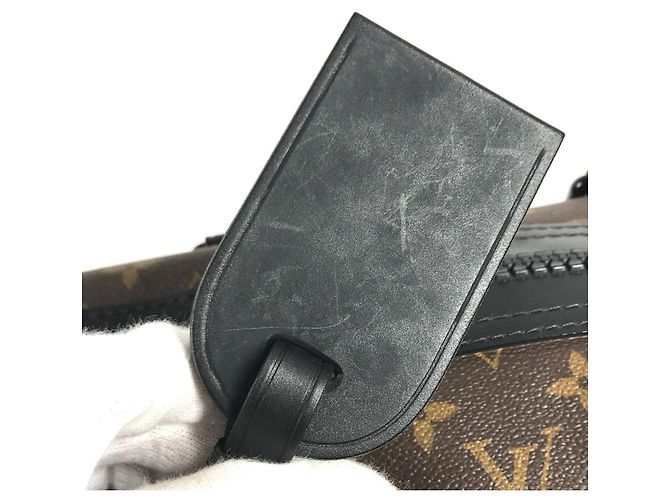 mala Louis Vuitton Monogram Waterproof Keepall Bandoulière 55 Marrom Preto - vista 10