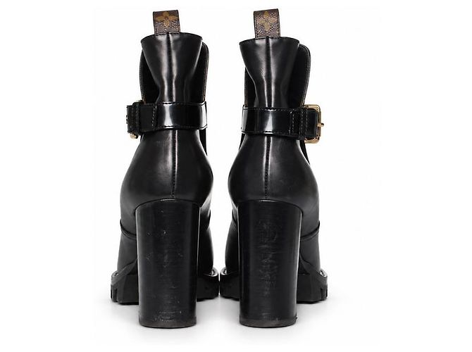 Louis Vuitton, botas de cano curto com fivela star trail Marrom Preto - vista 6