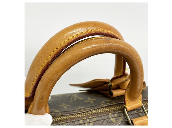 Louis Vuitton Boston Monogram Keepall 55 Marrom - vista 10