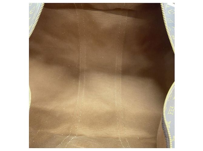 Louis Vuitton Boston Monogram Keepall 55 Marrom - vista 4