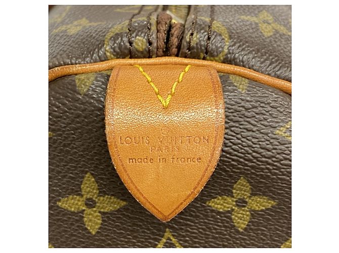 Louis Vuitton Boston Monogram Keepall 55 Marrom - vista 5