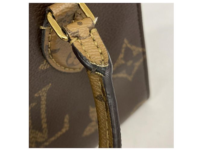 Bolsa Louis Vuitton Monogram Giant Reverse OnTheGo BB Marrom - vista 10