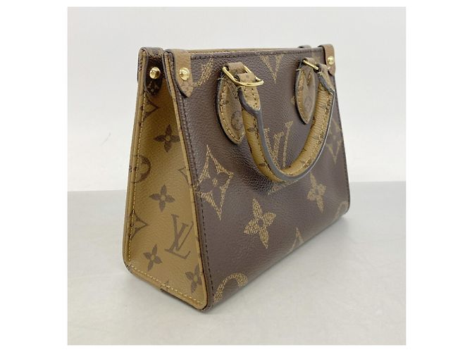 Bolsa Louis Vuitton Monogram Giant Reverse OnTheGo BB Marrom - vista 2