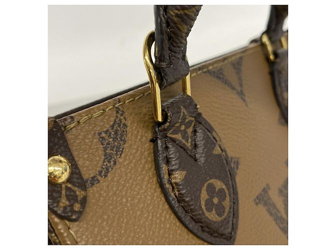 Bolsa Louis Vuitton Monogram Giant Reverse OnTheGo BB Marrom - vista 9